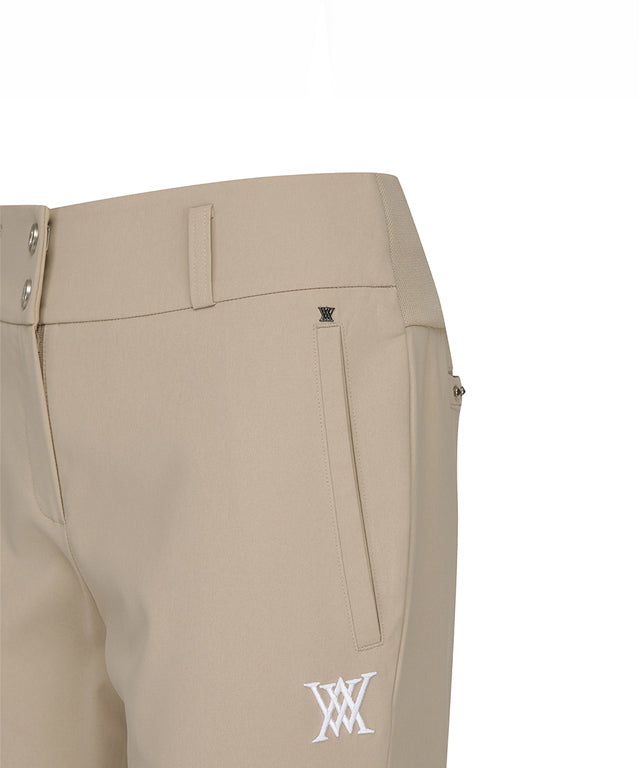 ANEW Golf Women Logo Band Point Long Pants featuring a straight fit and jacquard points, designed for comfort and style.